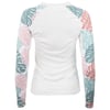 Back view of a long-sleeve rash guard with a tropical leaf pattern in pink and green on the sleeves, and a solid white back.