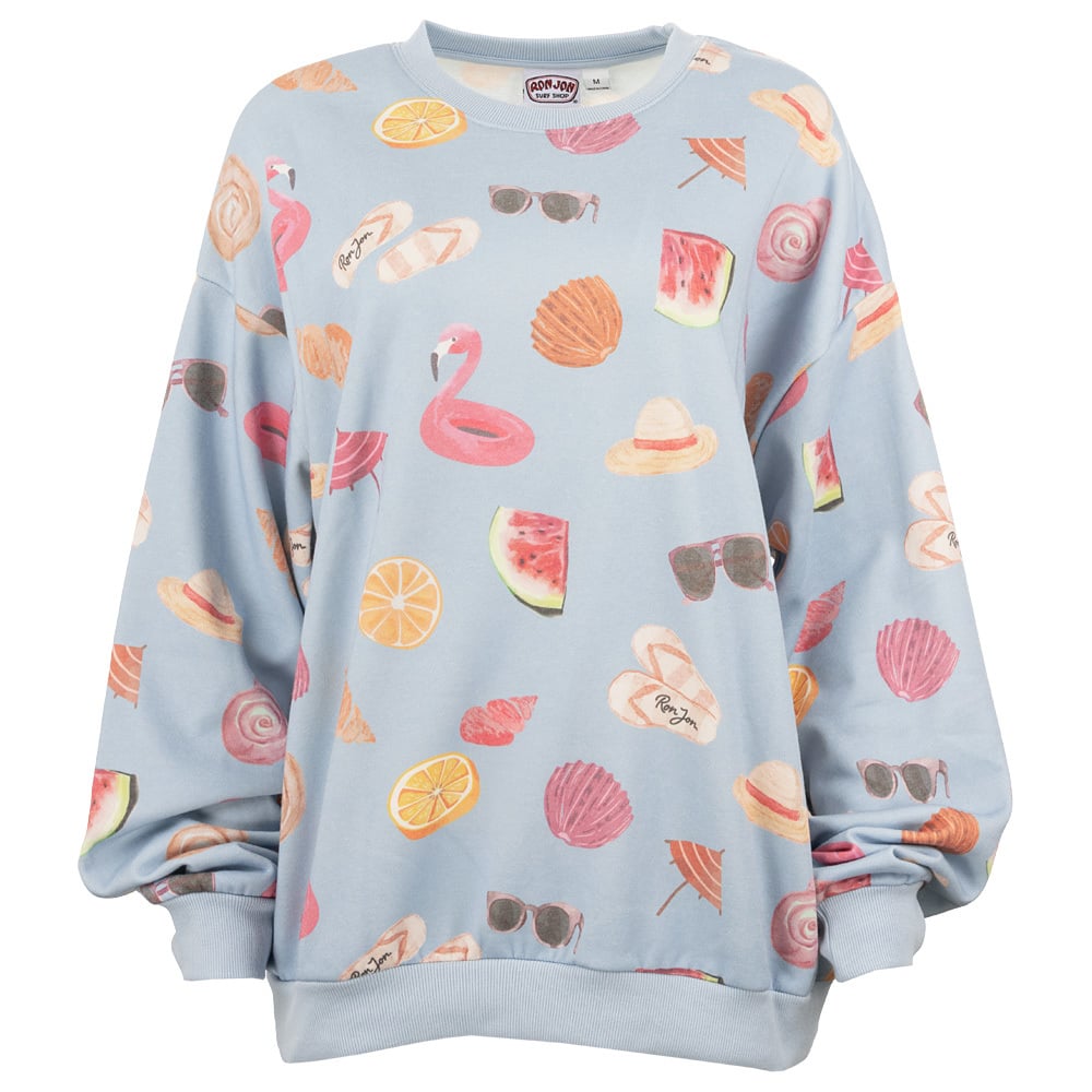 Blue sweatshirt with colorful printed images of flamingos, sunglasses, shells, watermelon slices, orange slices, hats, and flip-flops, displayed on a plain background.