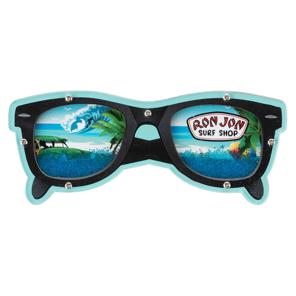 A sunglasses-shaped magnet with a beach scene, green car, and Ron Jon Surf Shop logo depicted on the lenses. Within the lenses are blue grains of shakeable sand.