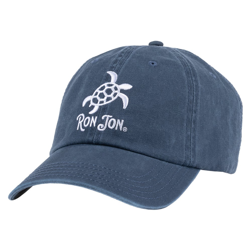 A blue baseball cap with a white embroidered turtle logo and the text Ron Jon on the front.