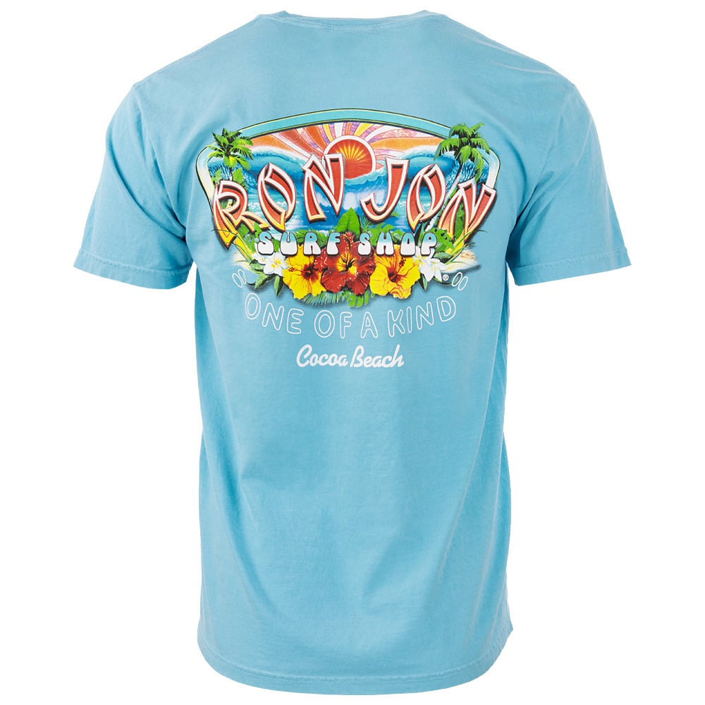 A light blue T-shirt with Ron Jon Surf Shop, tropical flowers, palm trees, and One of a Kind, Cocoa Beach printed on the back in colorful, bold lettering.