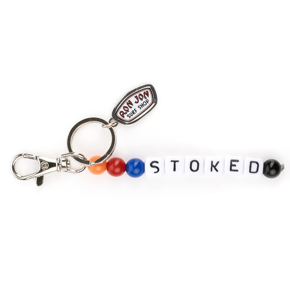 Keychain with colorful beads spelling STOKED and a metal tag labeled Ron Jon Surf Shop.