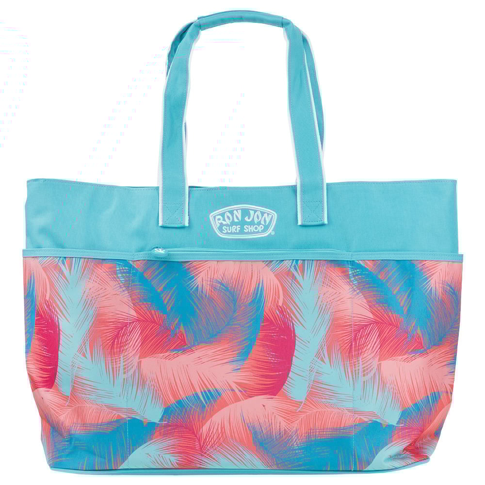 A tote bag with blue handles and top, featuring pink and turquoise palm leaf patterns. Logo reads Ron Jon Surf Shop.