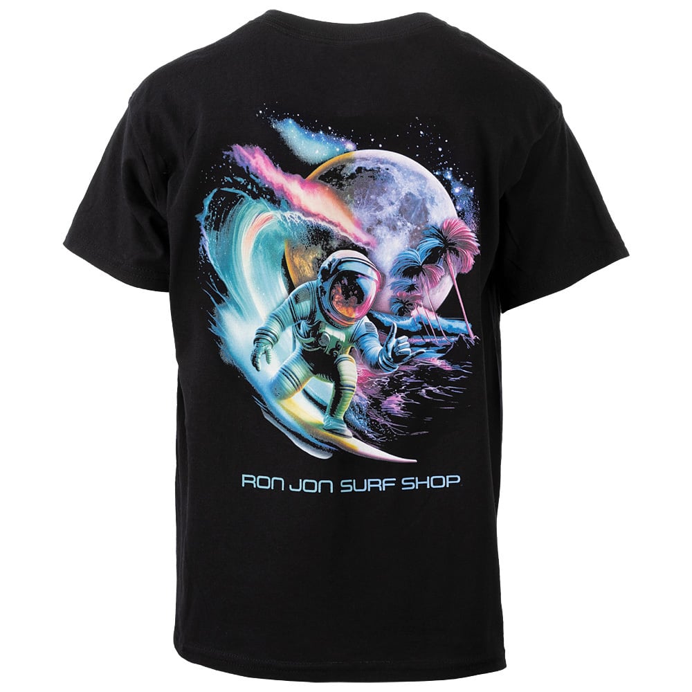 Black t-shirt with a colorful design of an astronaut surfing a wave with a palm tree and moon in the background. Text reads Ron Jon Surf Shop.