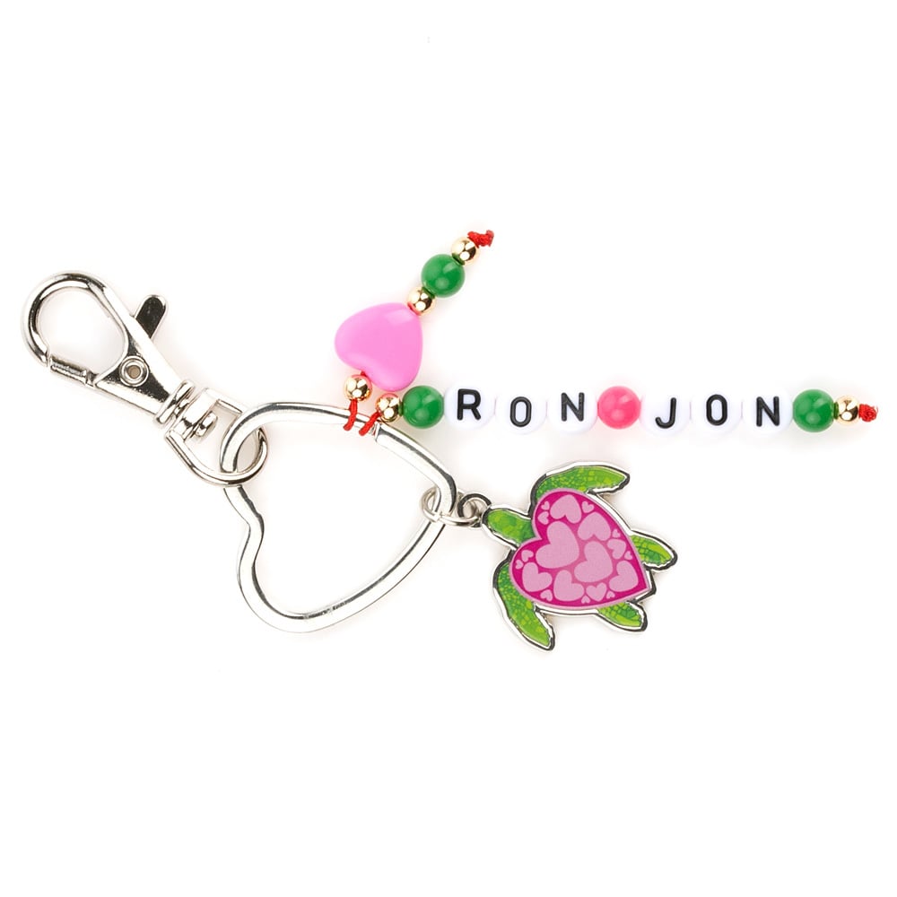 Heart-shaped keychain with beads spelling RON JON, featuring pink and green beads and a turtle charm with a pink shell.
