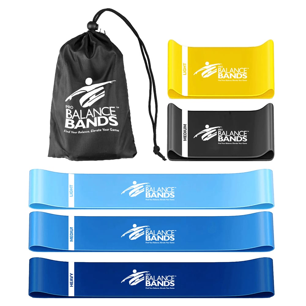 A set of five resistance bands in various colors and strengths, labeled light, medium, and heavy, displayed with a black drawstring carrying bag.