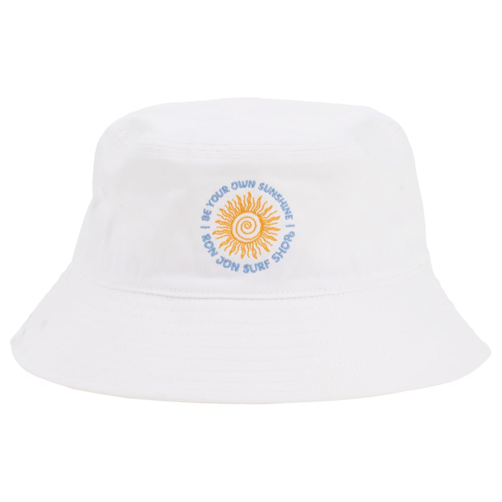 White bucket hat with an embroidered sun design and the words Be Your Own Sunshine in blue around the sun.