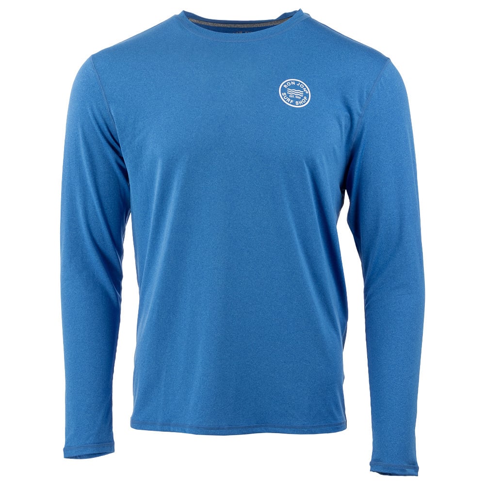 A plain blue long-sleeve rash guard with a small circular white logo on the left chest.