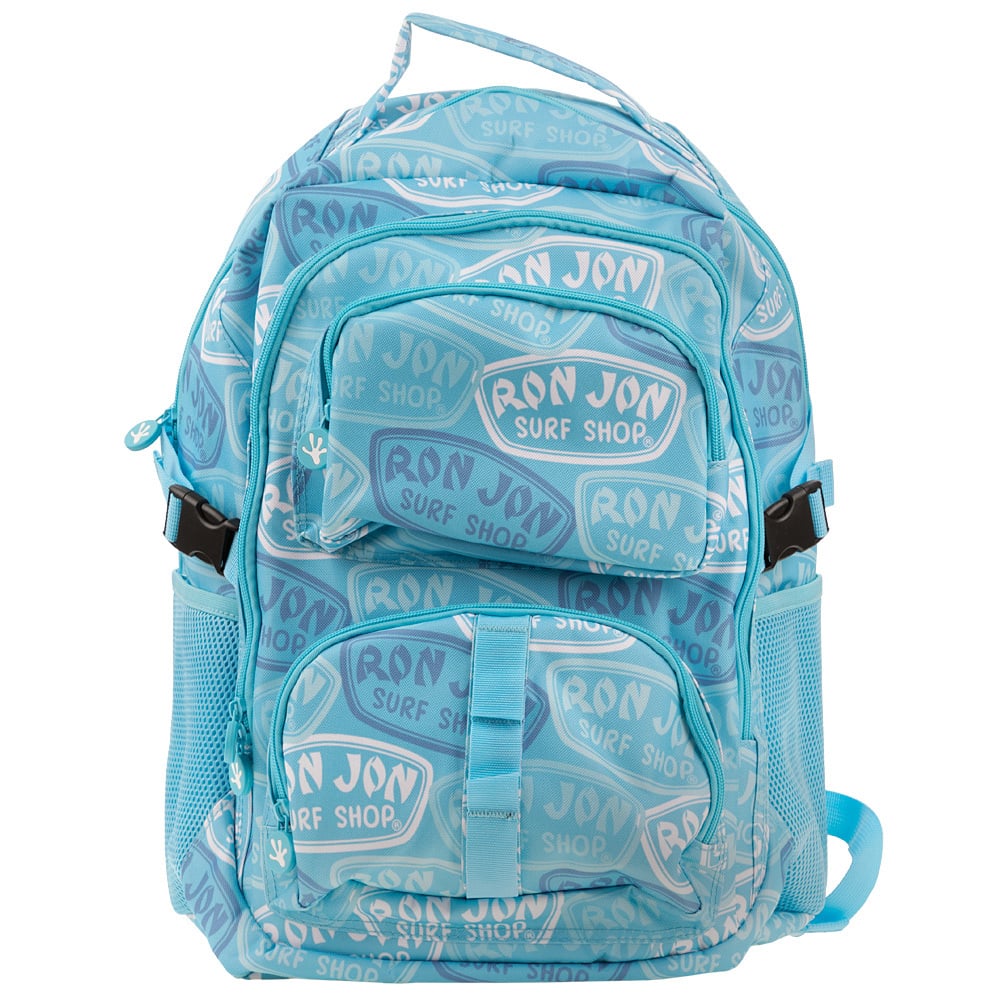 A light blue backpack with multiple zippered pockets, mesh side pockets, and an all-over RON JON SURF SHOP logo pattern.