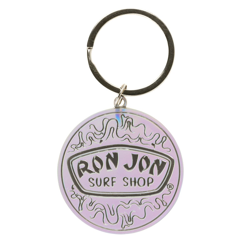 A round keychain with a pastel purple background featuring the text Ron Jon Surf Shop in black letters.