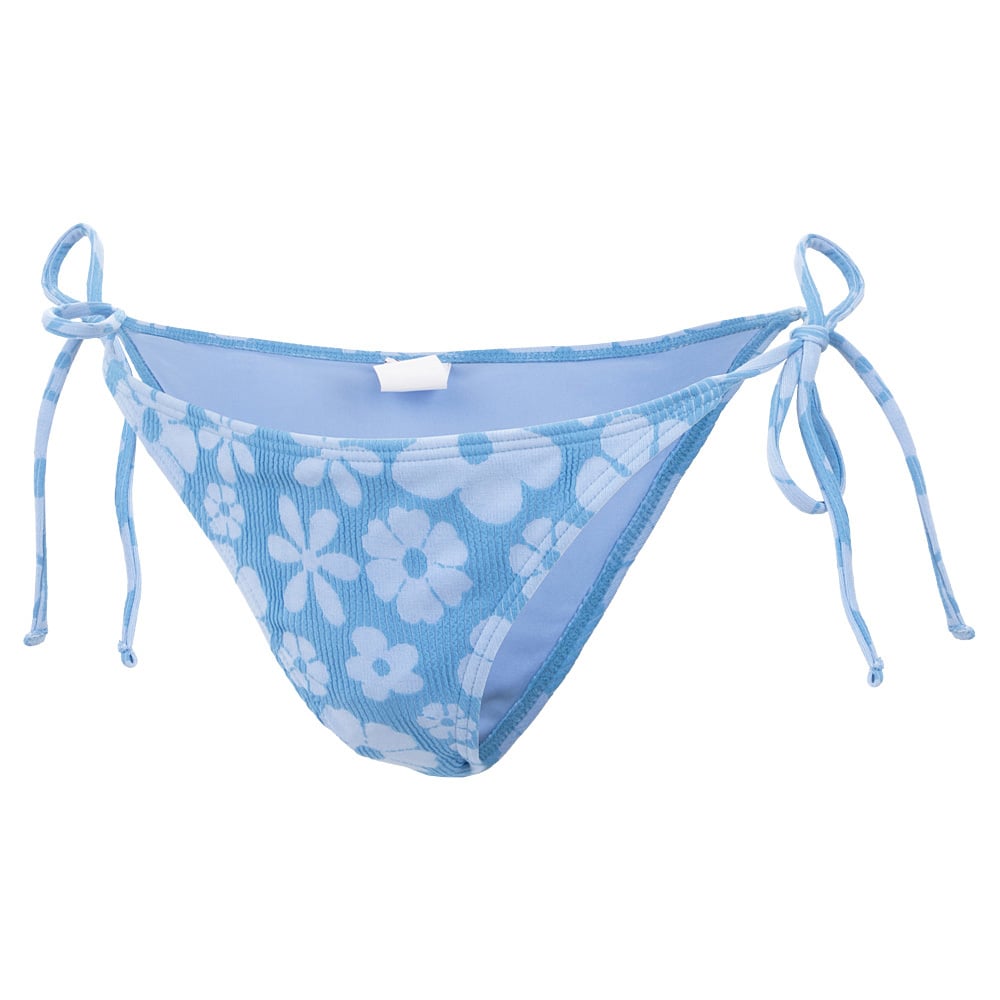 Light blue bikini bottoms with a white floral pattern and side ties.