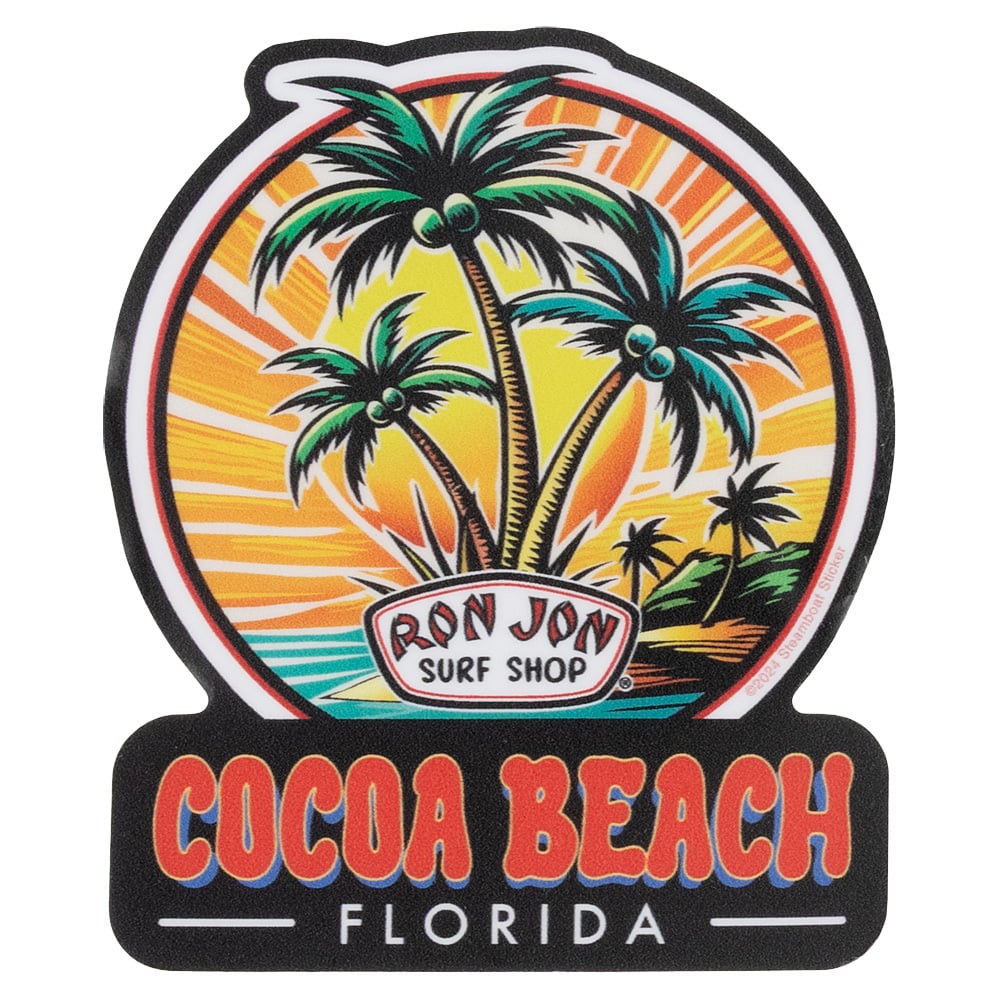 A colorful sign featuring palm trees, a sunset, and Ron Jon Surf Shop above the text Cocoa Beach Florida.