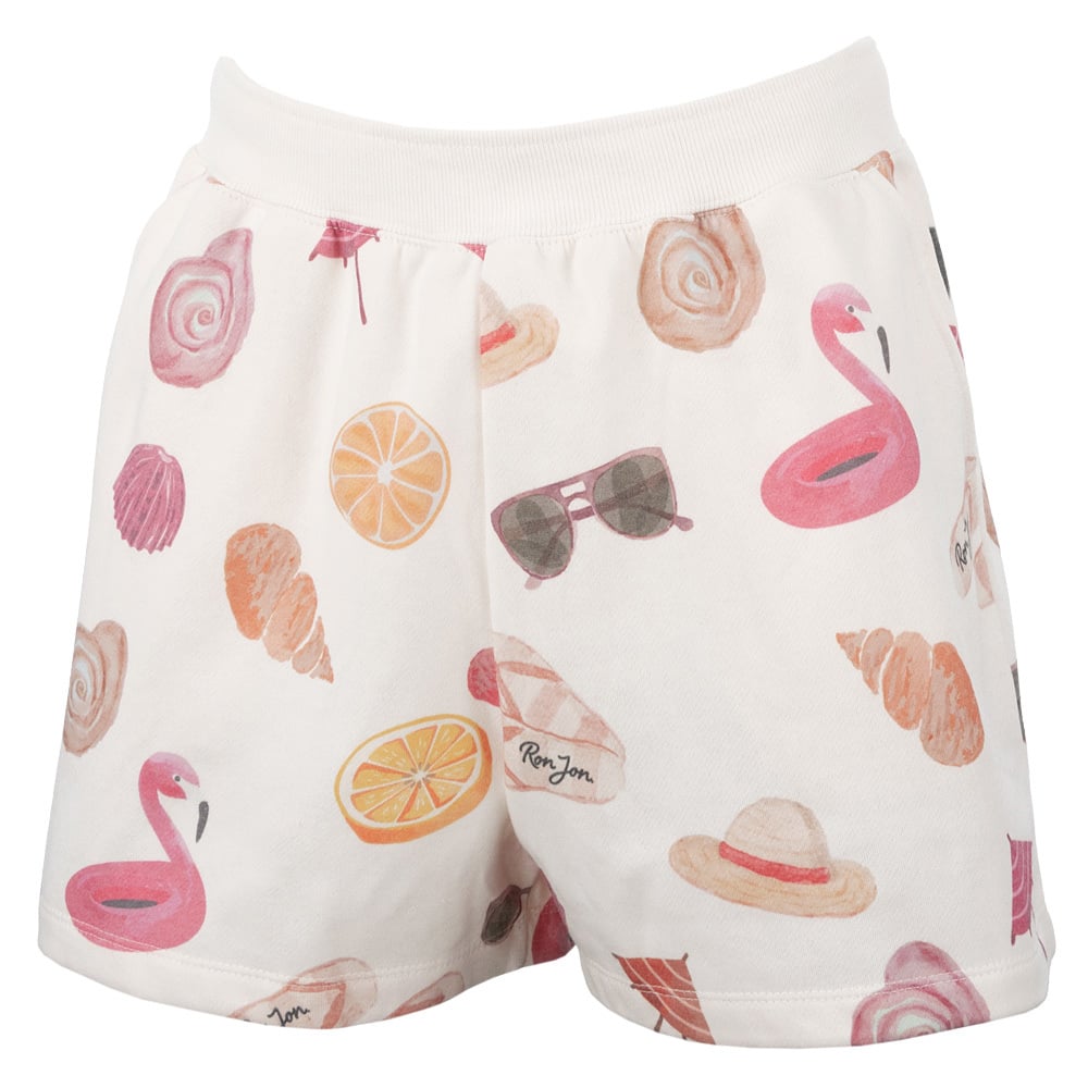 Cream shorts with a beach-themed pattern featuring pink flamingos, sunglasses, seashells, citrus slices, hats, and the text Ron Jon.