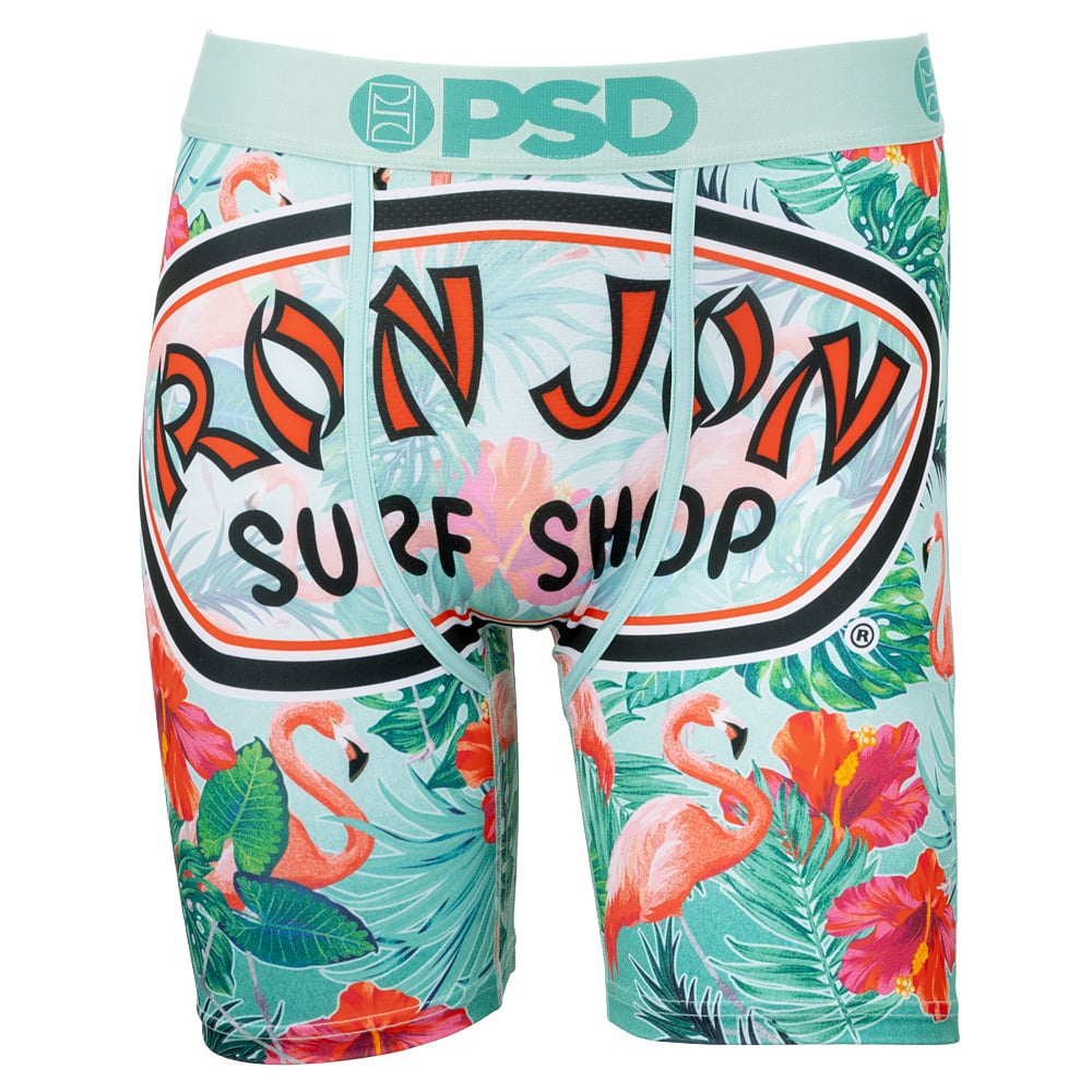 Men’s boxer briefs with a tropical print featuring pink flamingos, green leaves, red flowers, and a large “Ron Jon Surf Shop” logo on the front waistband area.