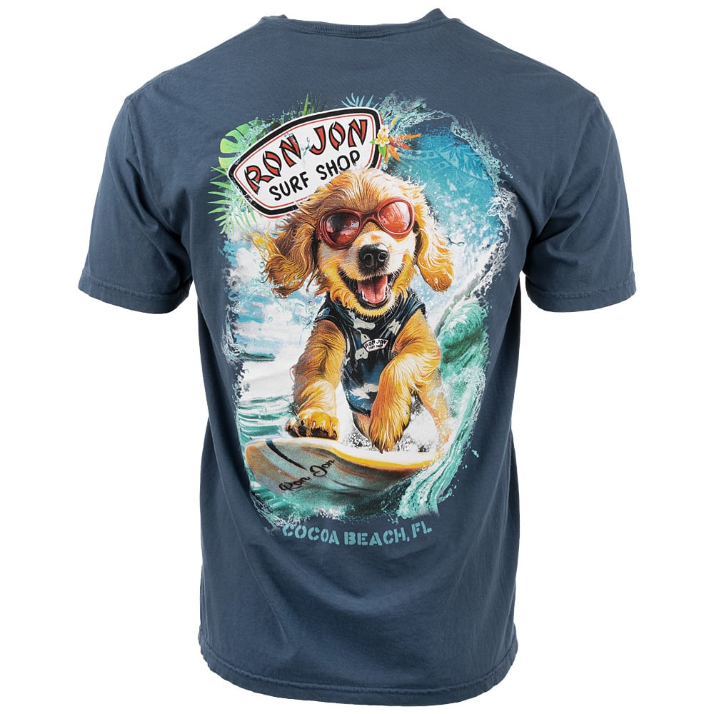 T-shirt featuring a cartoon dog surfing with sunglasses and a life vest. It includes the text Ron Jon Surf Shop and Cocoa Beach, FL.