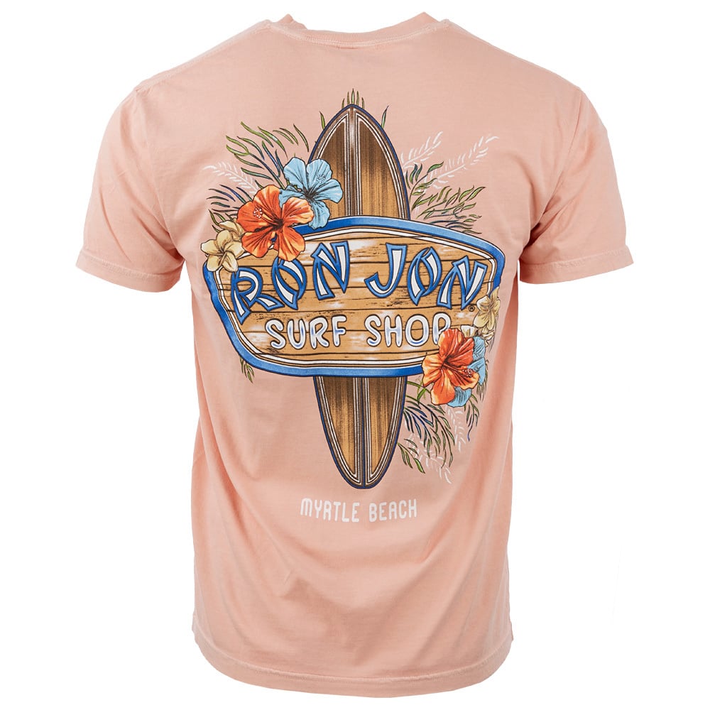 Back view of a pink T-shirt with Ron Jon Surf Shop and Myrtle Beach printed alongside a surfboard and flowers.