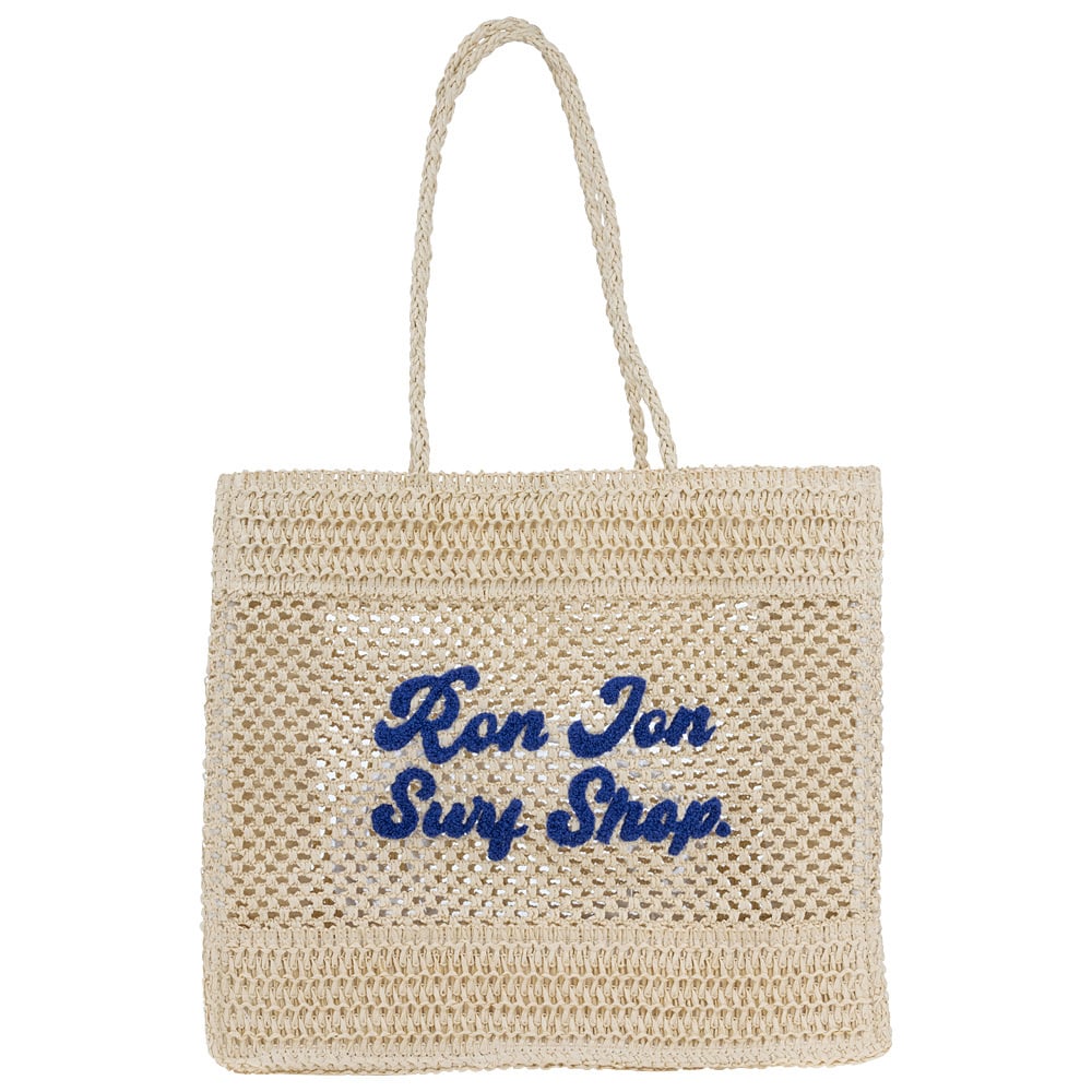 A beige macreme tote bag with Ron Jon Surf Shop in blue text on the front.
