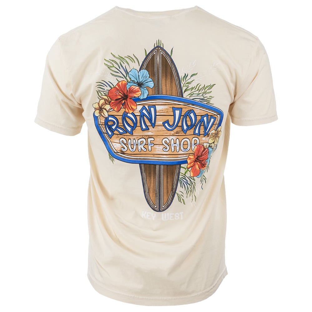 Beige T-shirt featuring a surfboard with flowers and text reading Ron Jon Surf Shop and Key West.