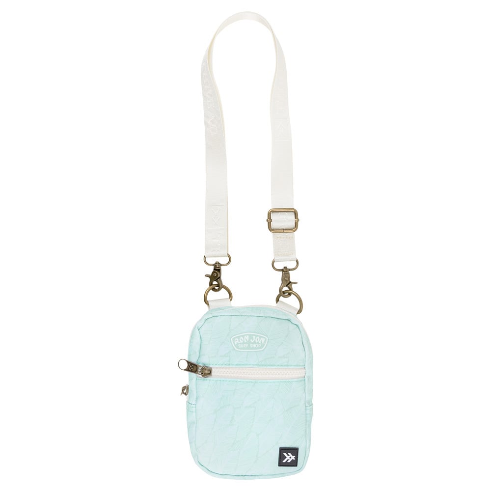 A small light blue crossbody bag with a white adjustable strap, zippered front pocket, and metal hardware. The front features a patch and a logo.