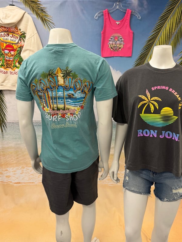 Displays of Ron Jon branded clothing, including a blue t-shirt, gray t-shirt, pink tank top, and a background with a beach scene and palm trees.